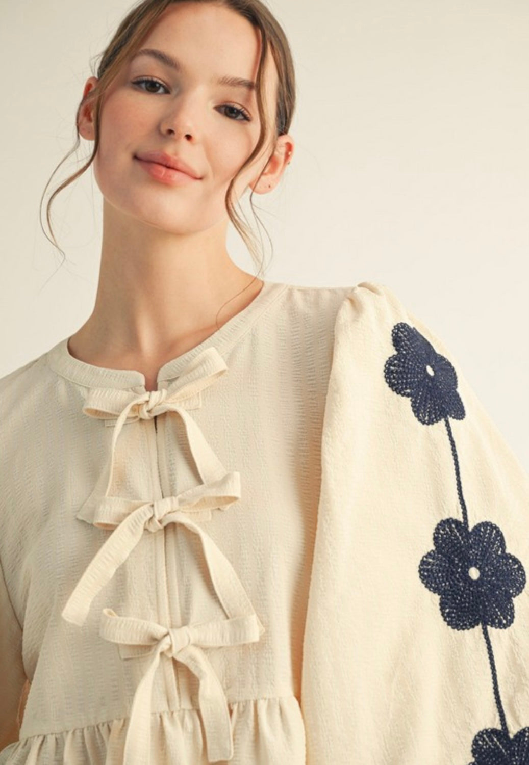 Embroidered Peplum Top