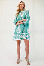 Border & Tassel Dress