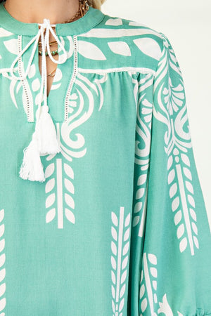 Border & Tassel Dress