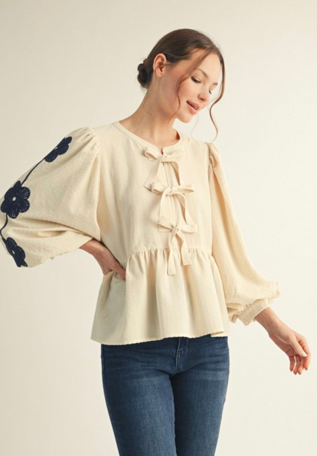 Embroidered Peplum Top