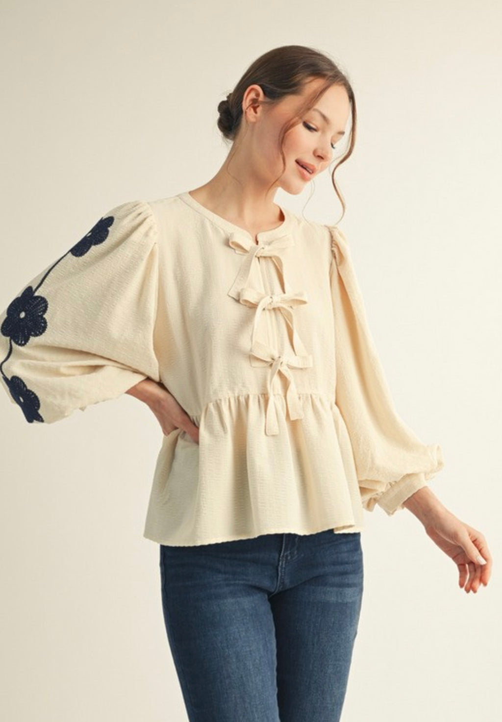 Embroidered Peplum Top