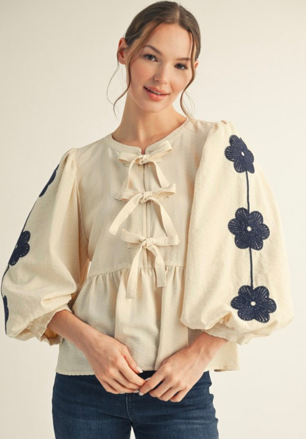 Embroidered Peplum Top