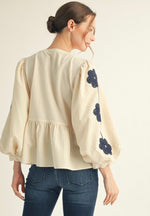 Embroidered Peplum Top